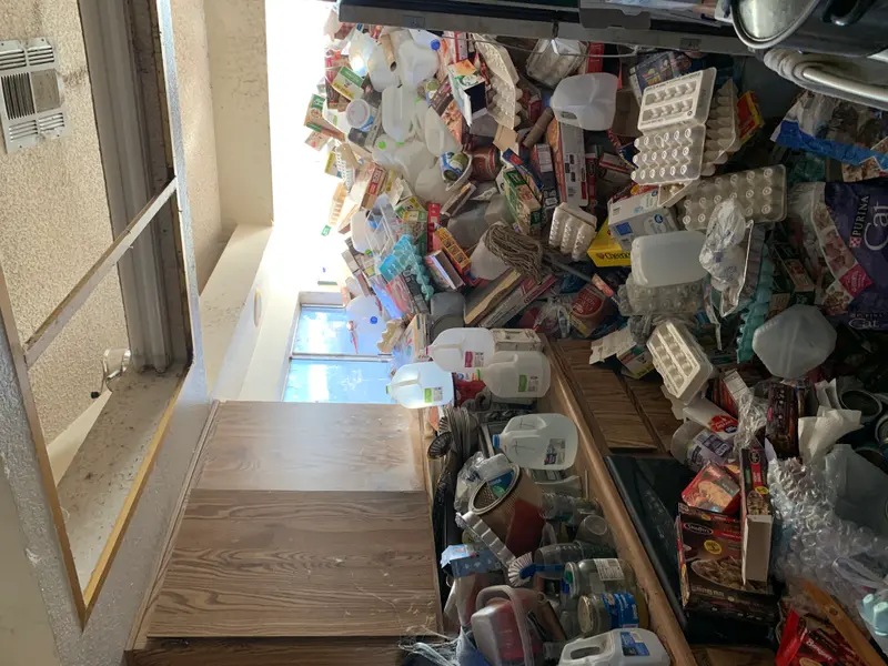 Hoarder home kitchen on 34th Street in Phoenix before purchase